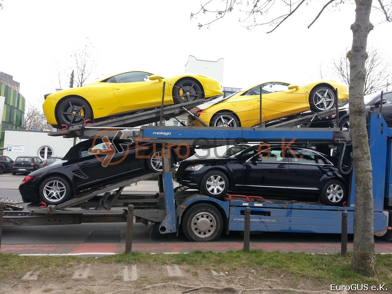 Fahrzeugüberführungen per offenen Autotransporter nach